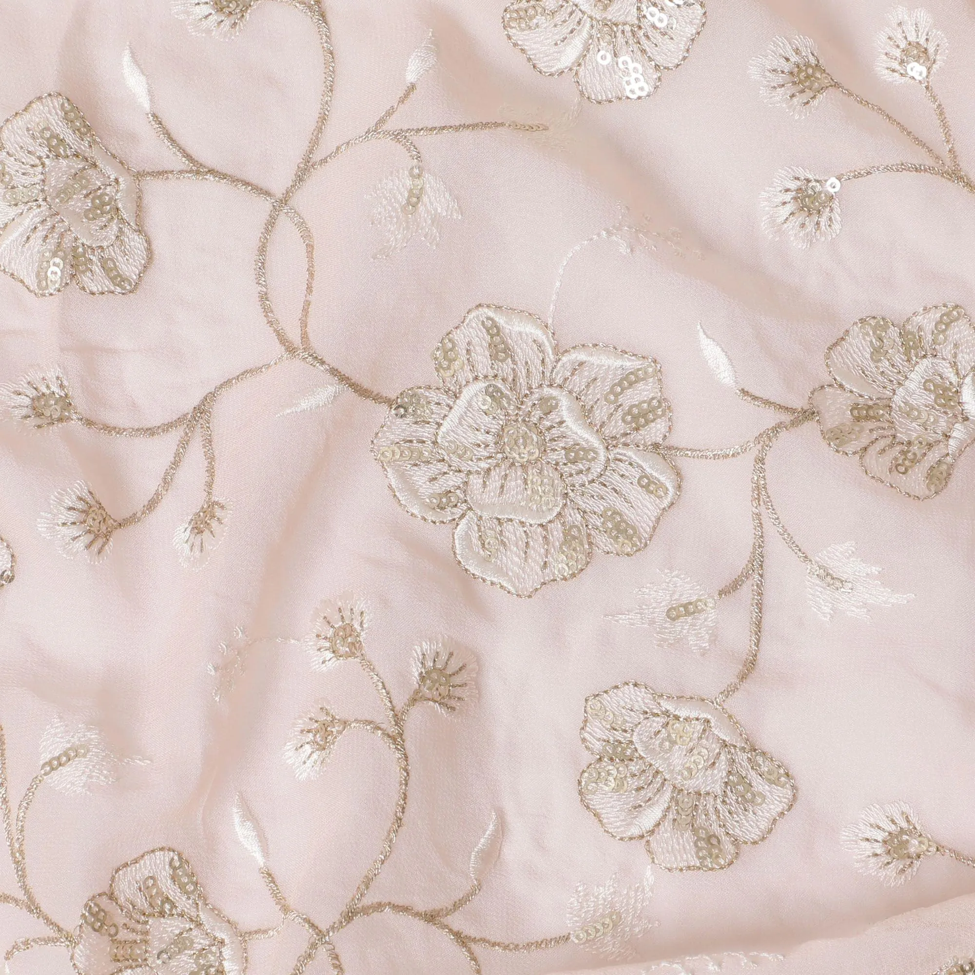 Light salmon peach synthetic georgette fabric with same tone and gold embroidery in floral design-D15821